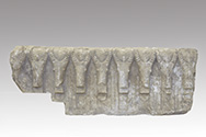  Fragment of a frieze carved with ibex heads   