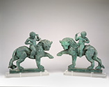  Pair of lions with riders 