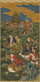 Two seated rakan at right—the first sewing, the second making notations.